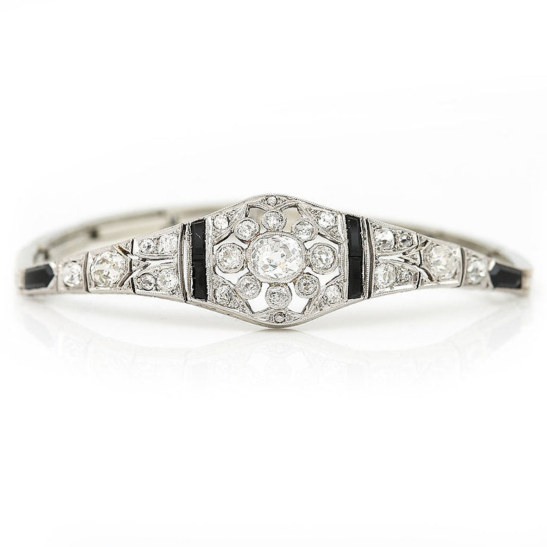 Art Deco 2ct Old Mine Cut Diamond and Onyx Bracelet, central 1ct G colour oval old mine cut diamond with a further 1ct diamond and calibre onyx in 18ct white gold