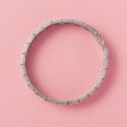 Art Deco 8.6ct Burma Ruby and 11.52ct Old Cut Diamond Bracelet in Platinum, zig-zag line of baguette-cut unheated Burma rubies flanked by old cut diamonds