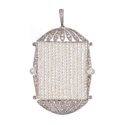Art Deco Natural Pearl and Diamond Pendant in Platinum, central panel with seed pearl rows in rose cut diamond set frame with natural pearl to each side