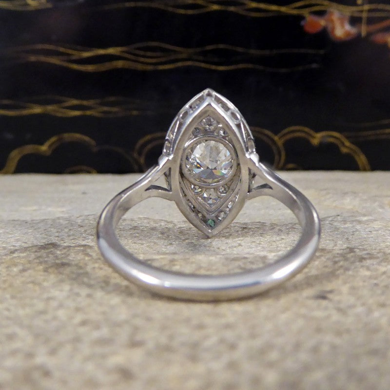 Art Deco Navette Shaped Diamond and Emerald Cluster Ring