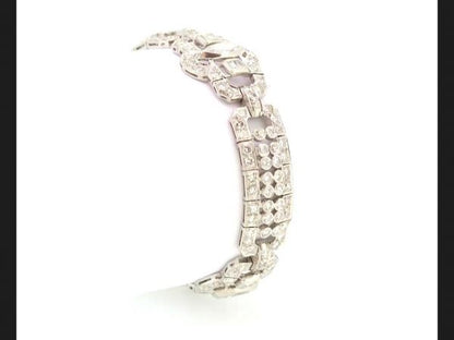 A Luxurious Art Deco diamond bracelet, a statement piece exhibiting the decadence of the era, circa 1930. Est. diamond weight totaling 12ct, Set in Platinum