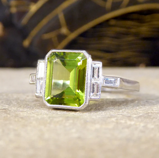 Art Deco Style Peridot Ring with Diamond Set Shoulder