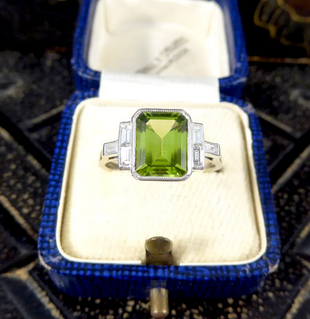 Art Deco Style Peridot Ring with Diamond Set Shoulder
