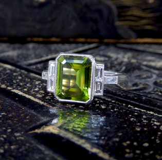 Art Deco Style Peridot Ring with Diamond Set Shoulder
