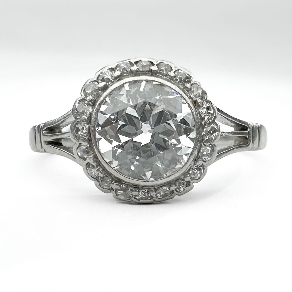 Art Deco Edwardian diamond halo engagement ring, platinum Old European  cut