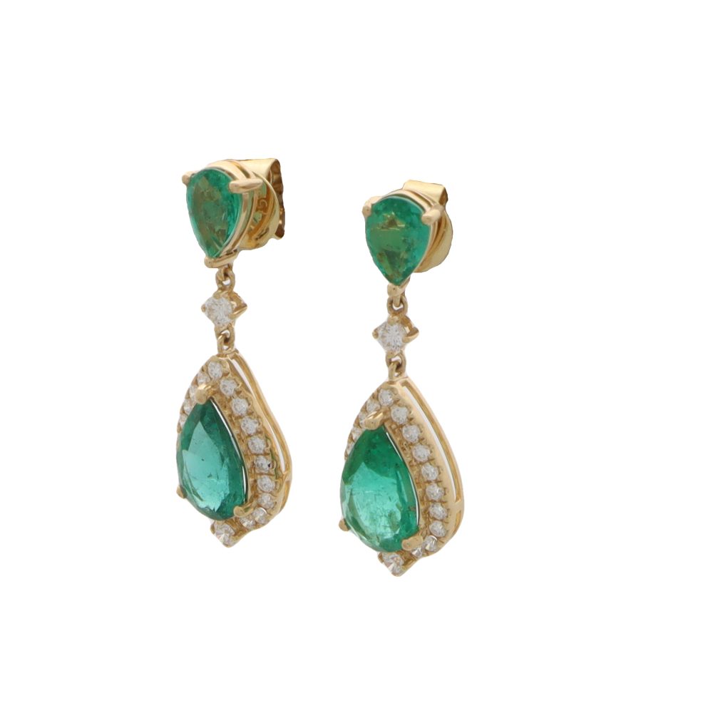 Emerald and diamond earrings in gold.