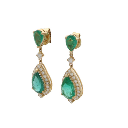 Emerald and diamond earrings in gold.