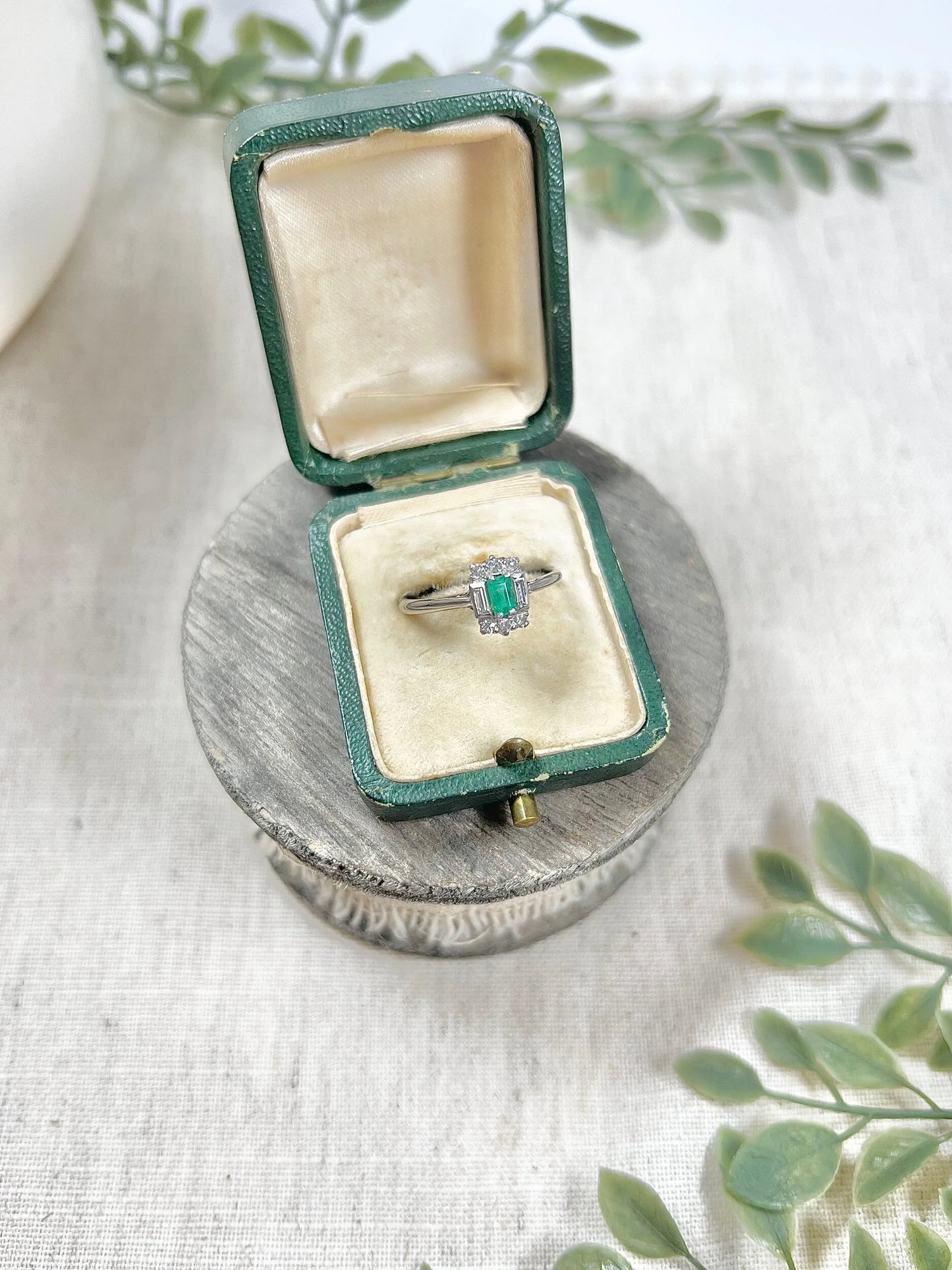 Vintage 18 Carat White Gold Emerald Cut Emerald and Diamond Cluster Ring, Circa 1940