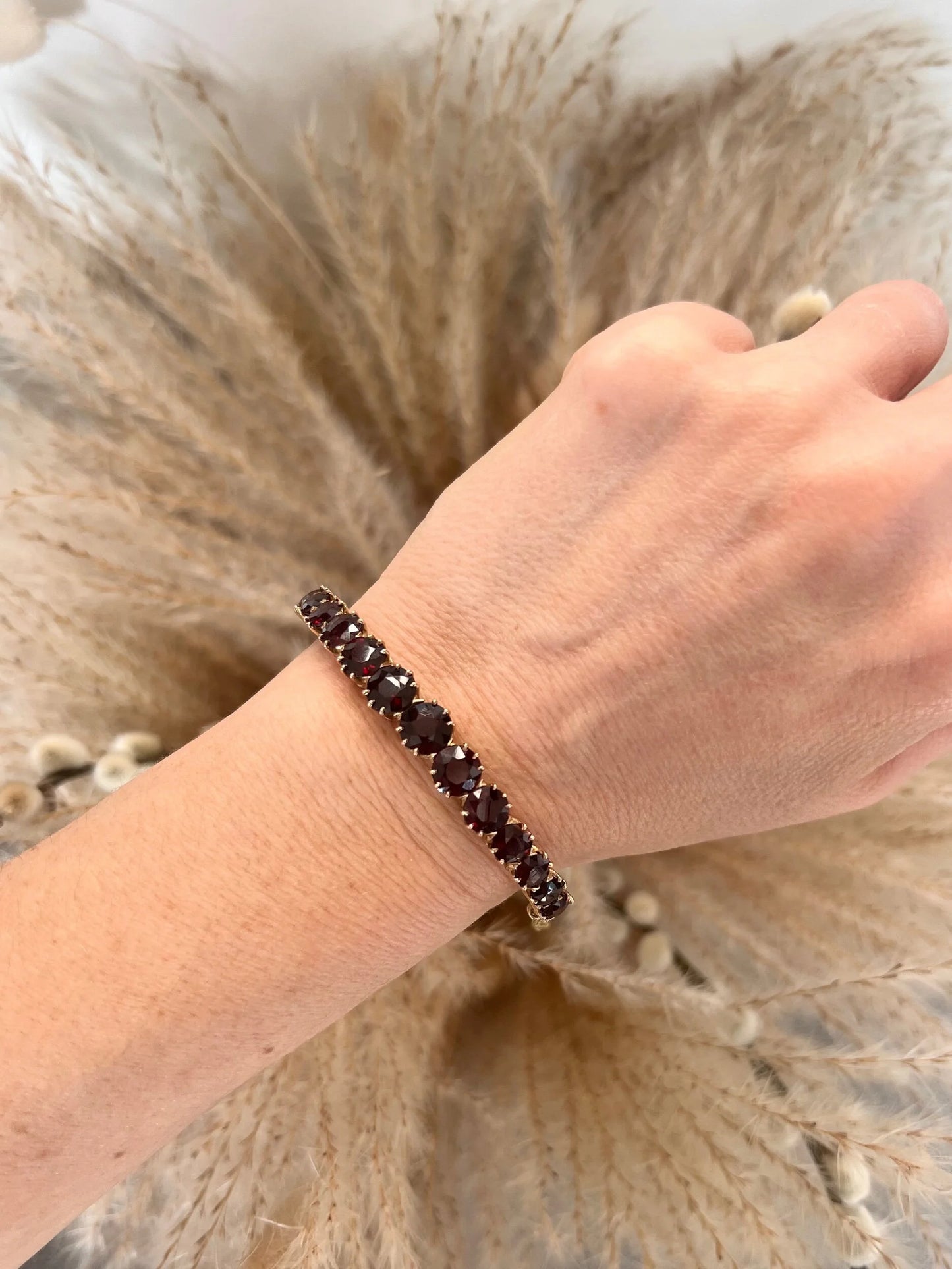 Antique Edwardian 14 Carat Gold Faceted Garnet Bangle Bracelet, Circa 1900