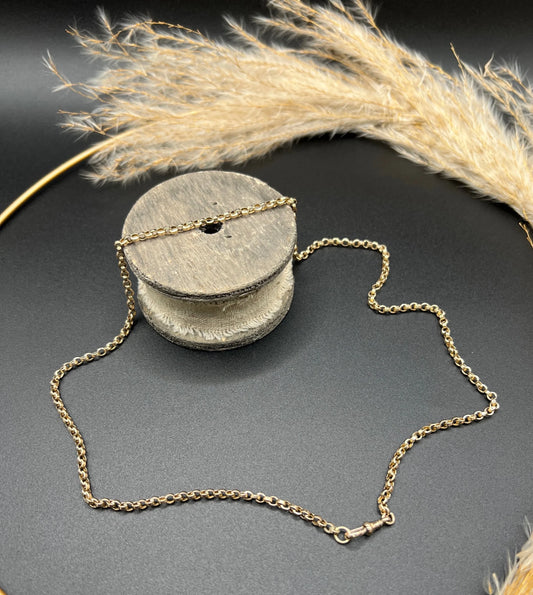 A rose gold rolo link chain necklace