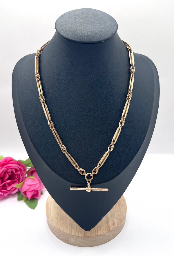 A rose gold fancy link Albert chain necklace