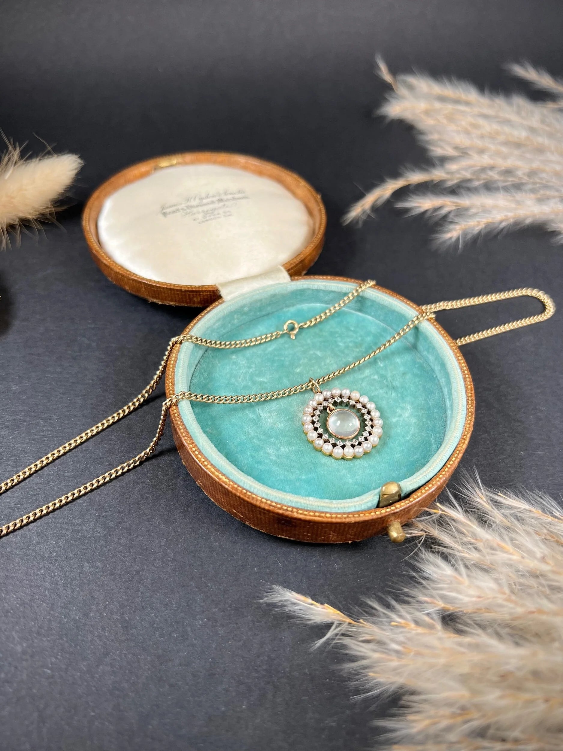 Antique 18 Carat Gold, Platinum, Moonstone, Diamond and Pearl Halo Pendant