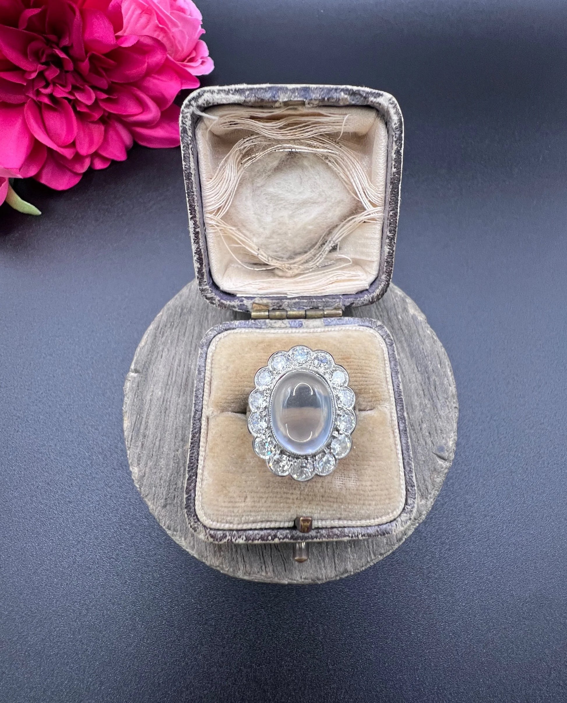 Antique French Platinum Cabochon Moonstone and Diamond Cluster Ring, Circa 1920