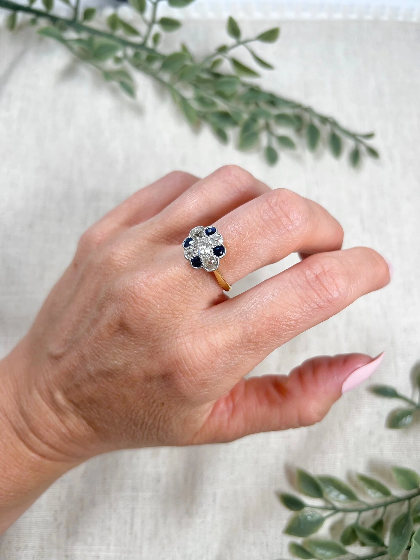 Edwardian 18 Carat Gold, Platinum, Sapphire and Diamond Daisy Cluster Ring, Circa 1910