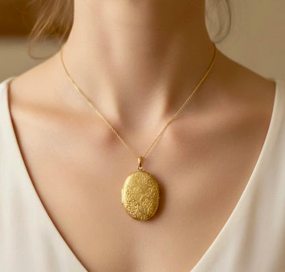 Victorian 18 Carat Yellow Gold Floral Engraved Oval Shaped Locket, Circa 1880