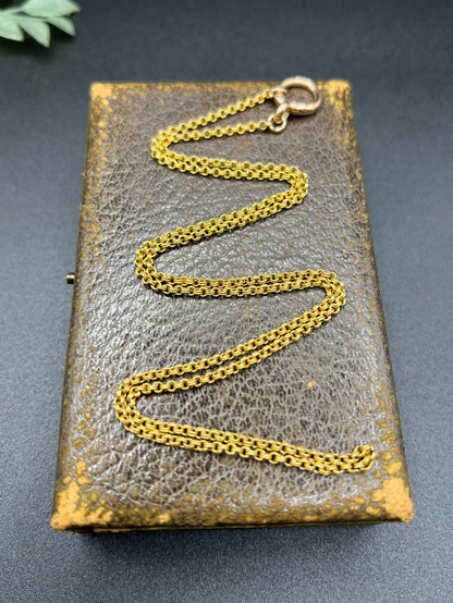 A yellow gold rolo link chain necklace