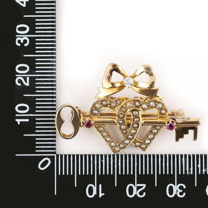 Antique Victorian 15 Carat Gold Pearl Dual Sweet Heart Ruby Key and Diamond Bow Brooch