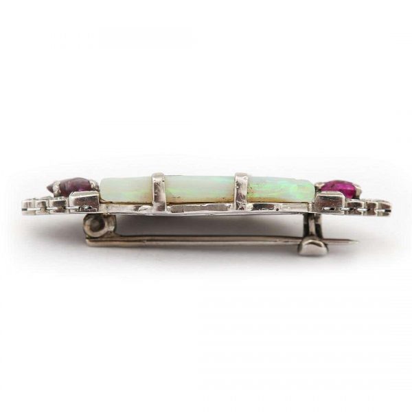 Antique Art Deco Platinum 7.30ct Carved Opal Ruby and Diamond Brooch Circa 1920