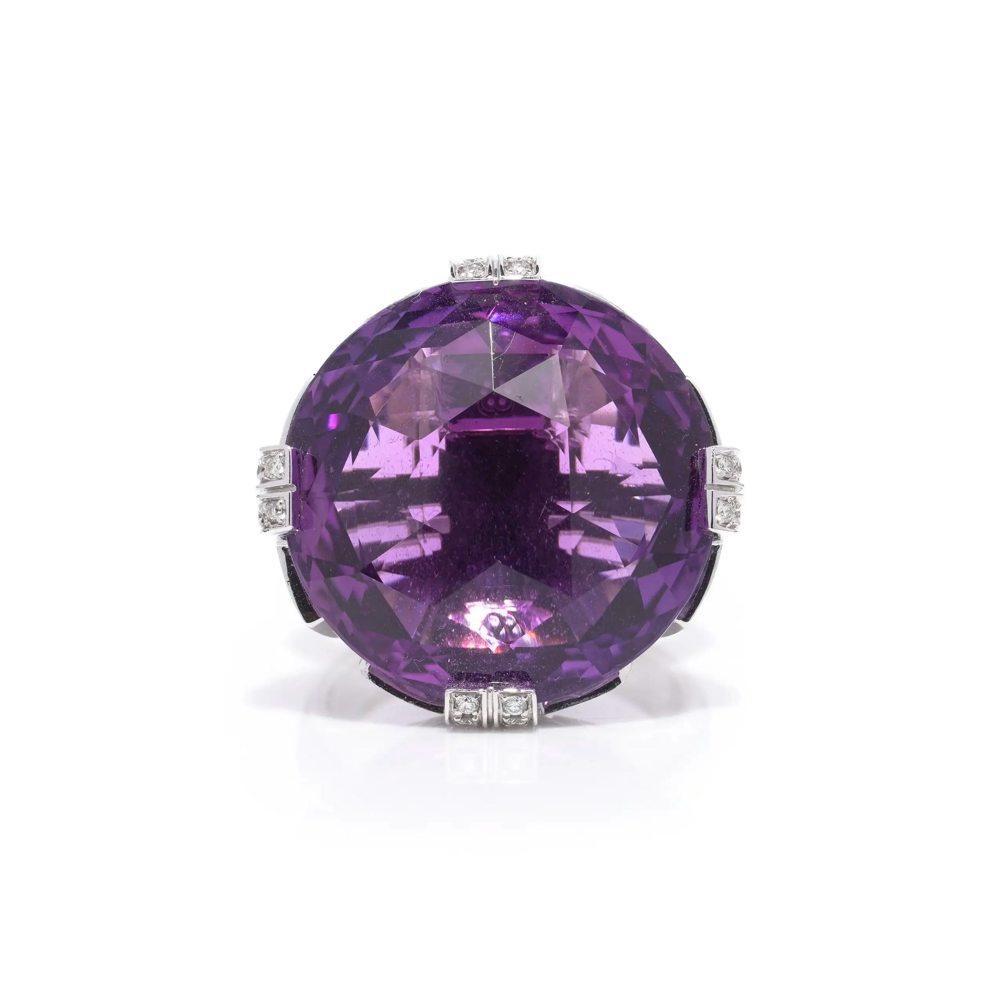 A round amethyst and diamond cocktail ring in white gold
