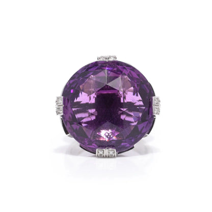 A round amethyst and diamond cocktail ring in white gold