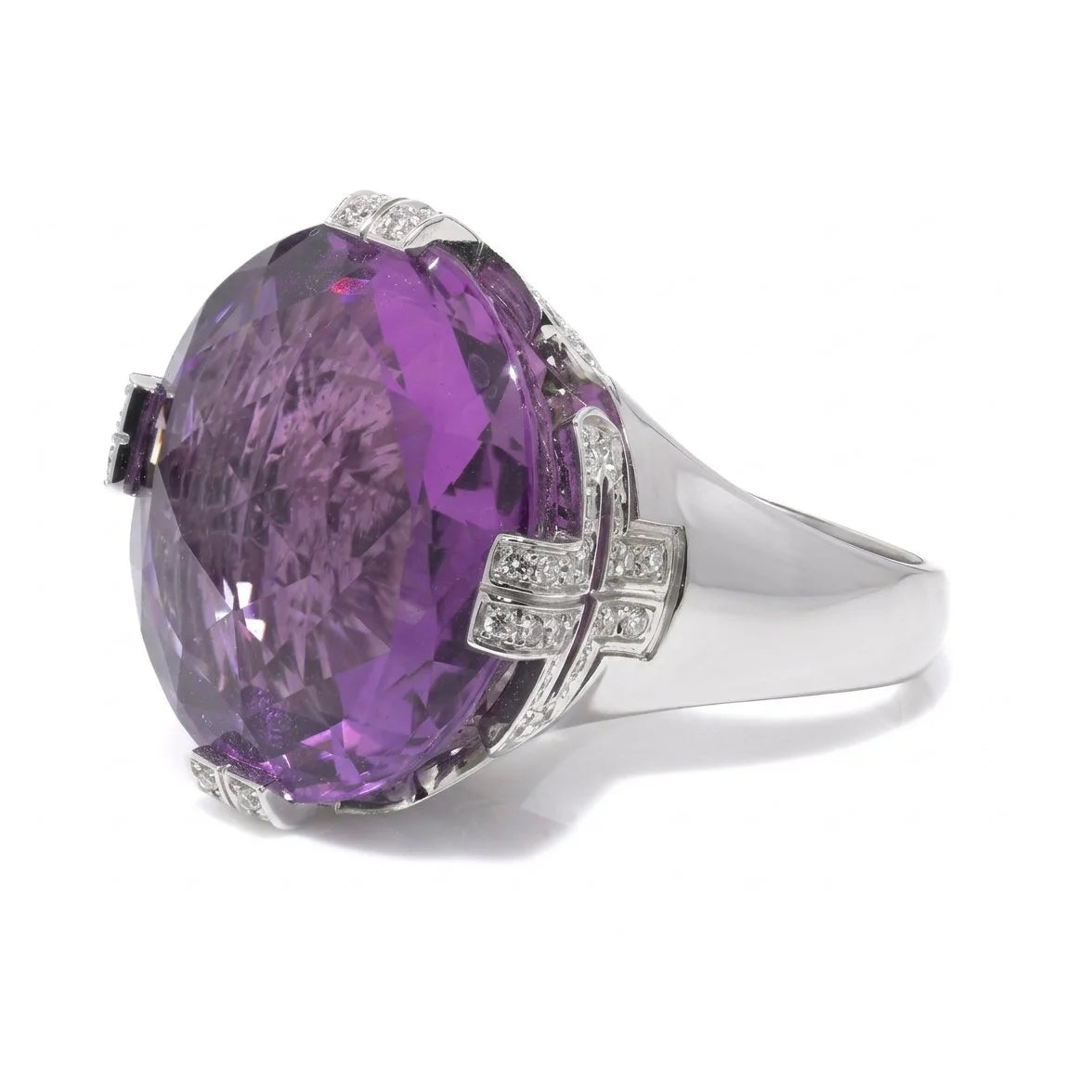 A round amethyst and diamond cocktail ring in white gold