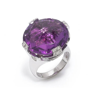 A round amethyst and diamond cocktail ring in white gold