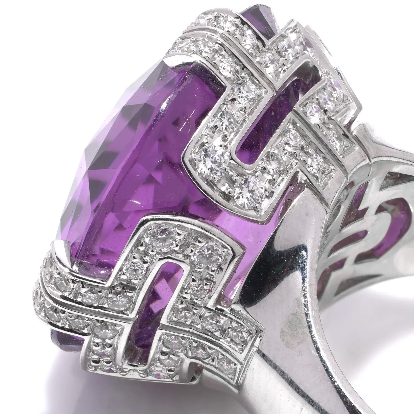 A round amethyst and diamond cocktail ring in white gold