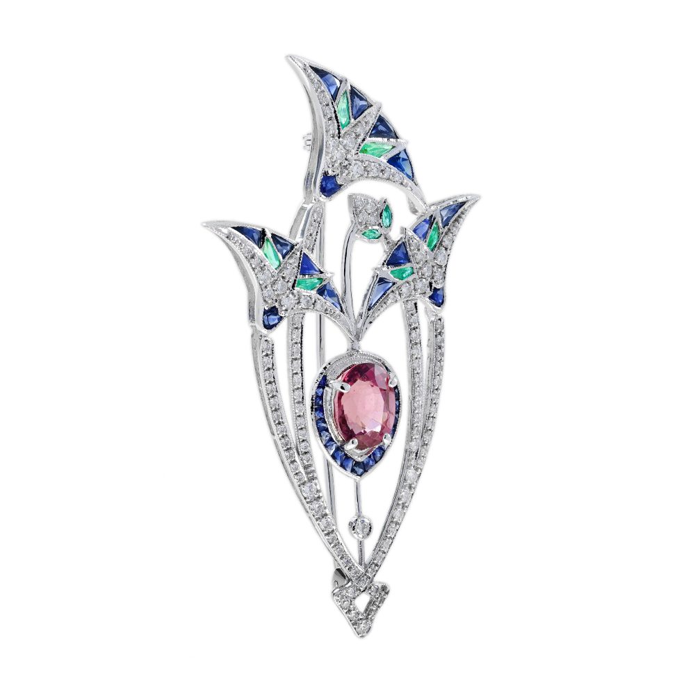 3.35ct Pink Tourmaline Sapphire Emerald and Diamond Brooch depicting a central pink lotus flower bud under its leaves in 18ct white gold