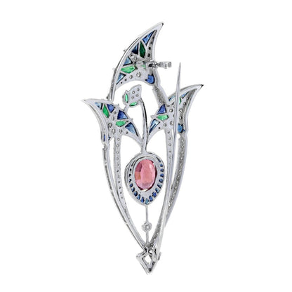 3.35ct Pink Tourmaline Sapphire Emerald and Diamond Brooch depicting a central pink lotus flower bud under its leaves in 18ct white gold