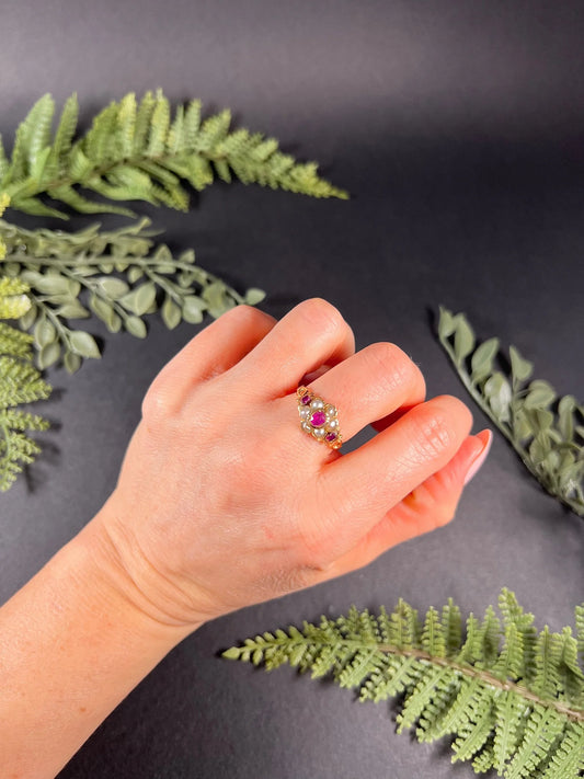 A yellow gold ruby and pearl floral cluster ring, modelled on a hand