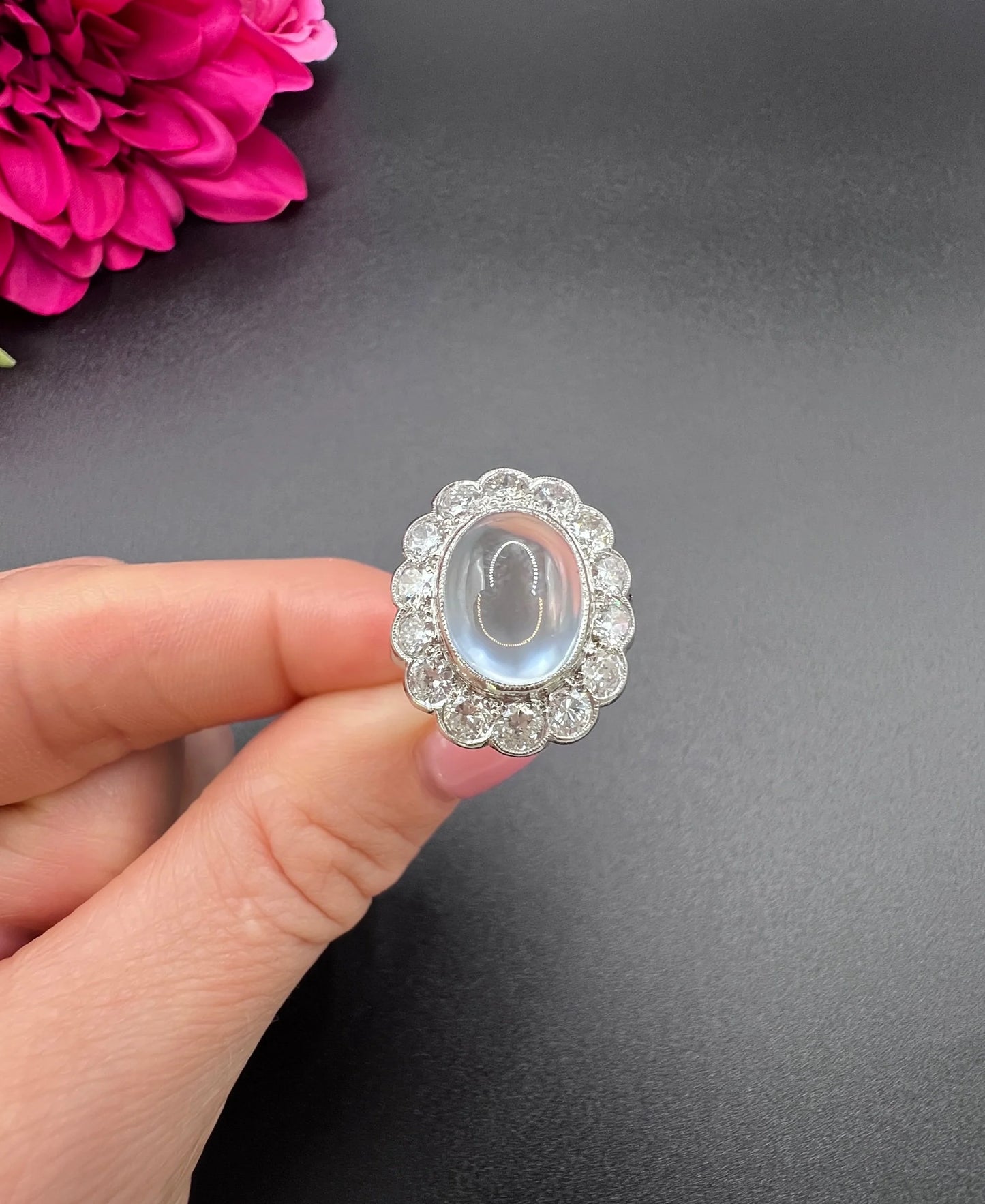 Antique French Platinum Cabochon Moonstone and Diamond Cluster Ring, Circa 1920