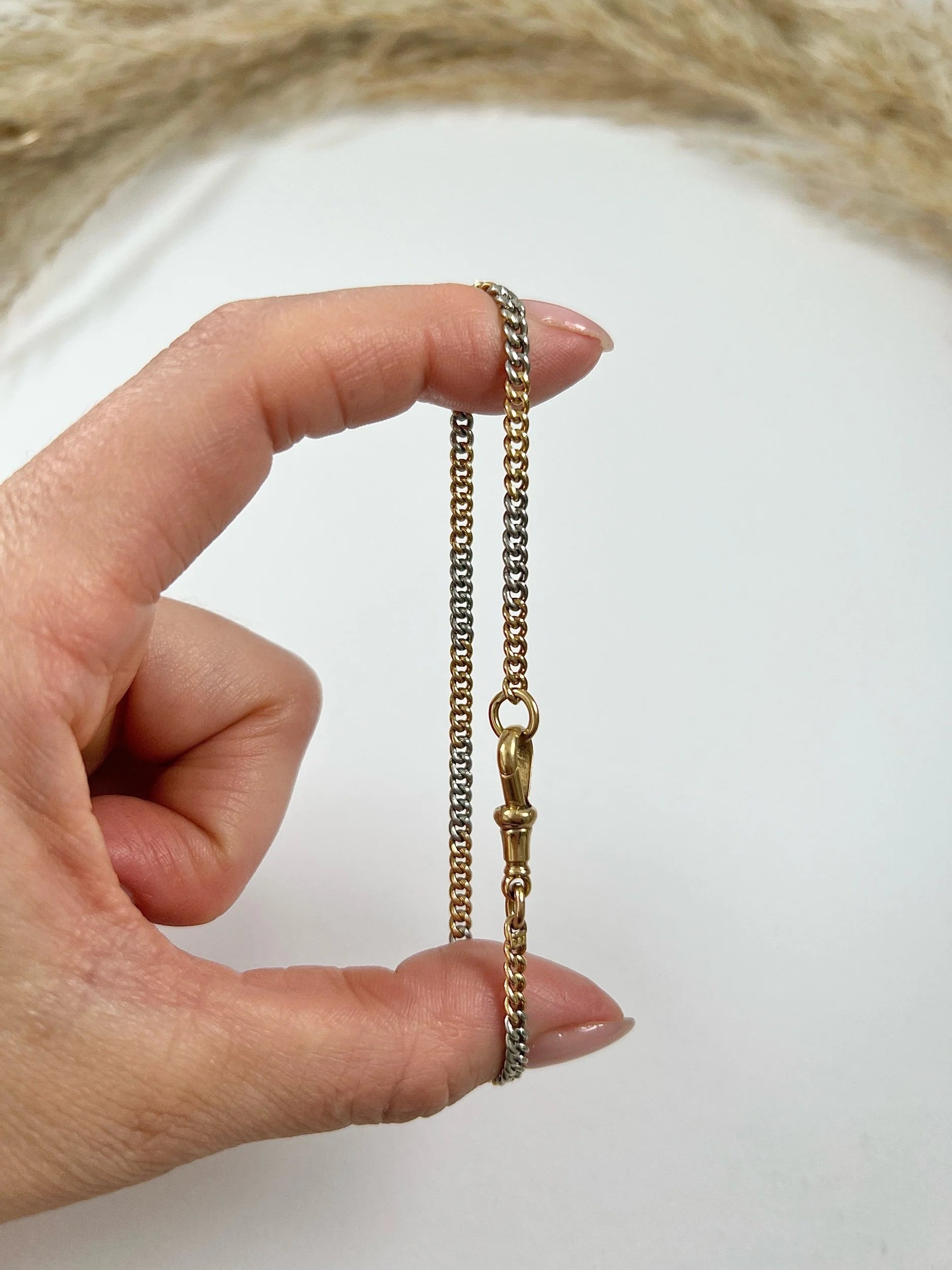 Antique 18 Carat Gold and Platinum Curb Link Bracelet with Swivel Clasp, Circa 1920