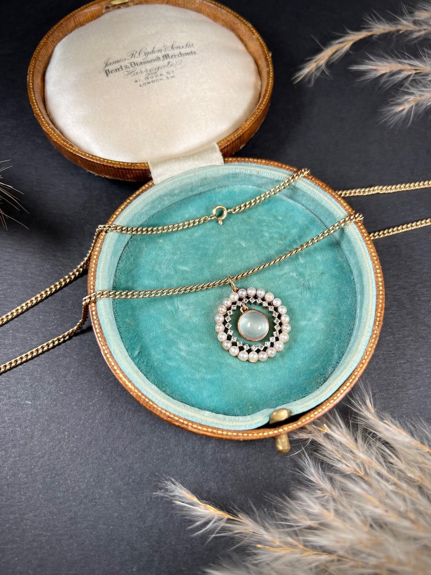 Antique 18 Carat Gold, Platinum, Moonstone, Diamond and Pearl Halo Pendant