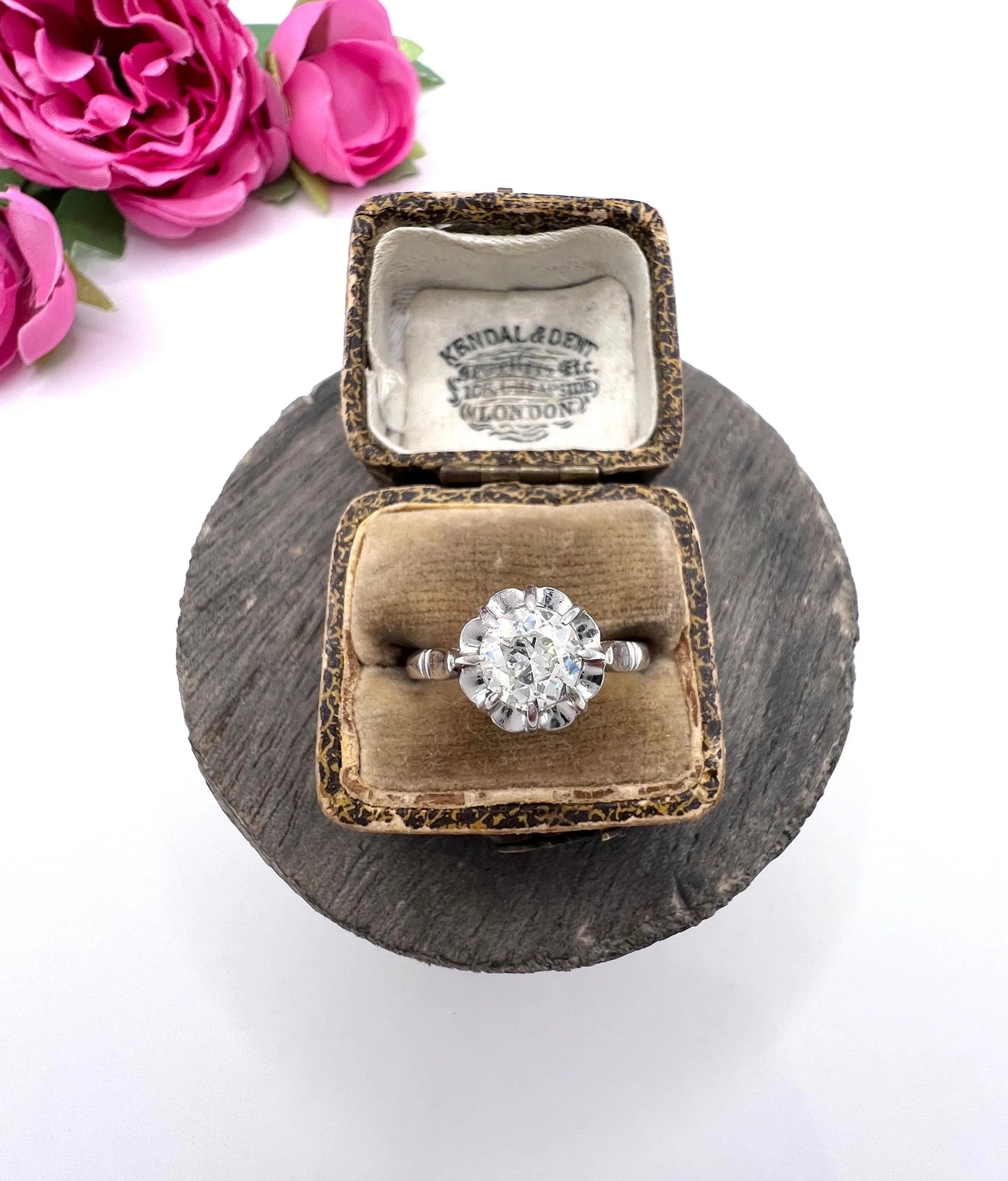A solitaire diamond ring in platinum, in an antique ring box