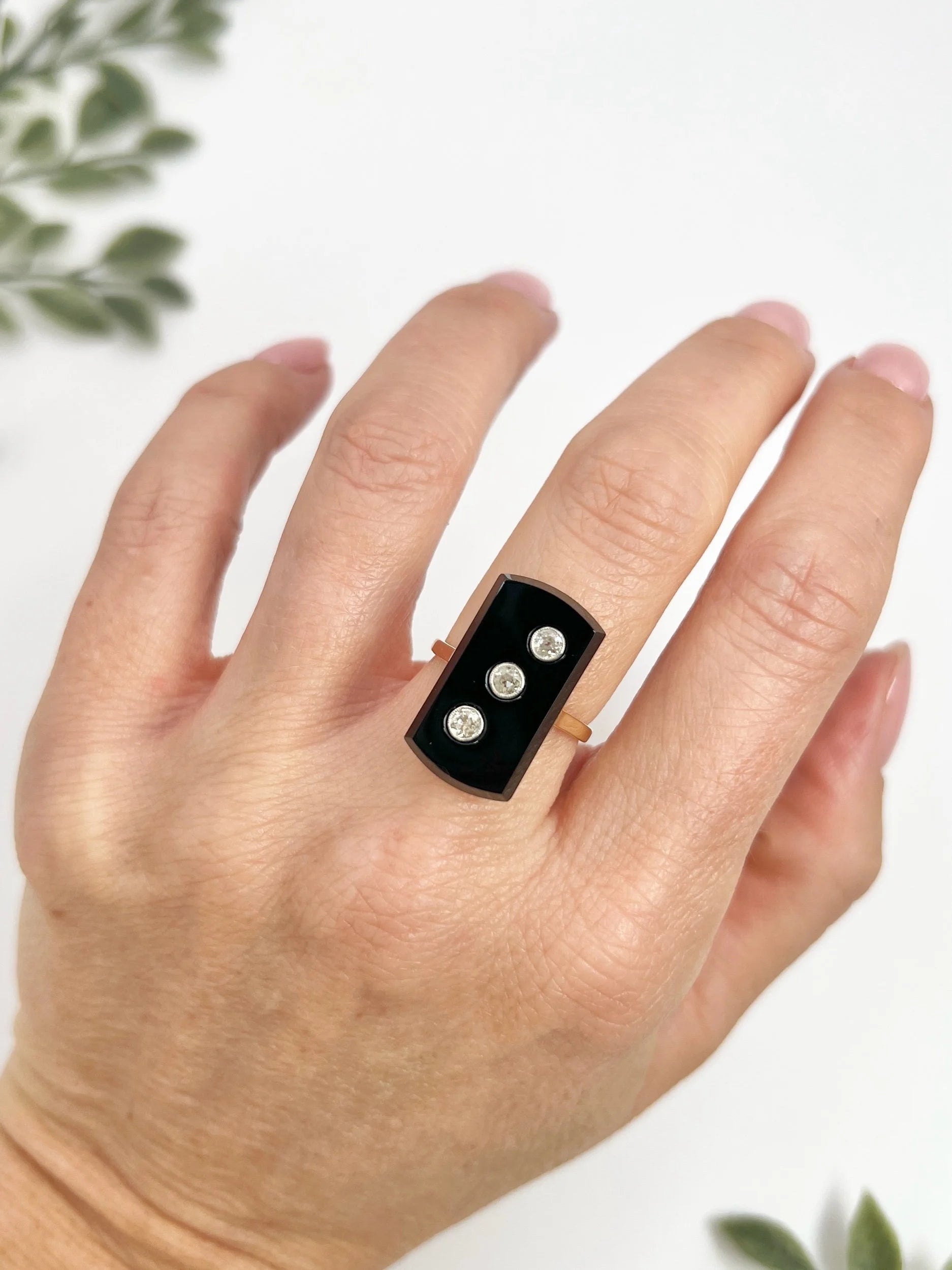 Art Deco 18 Carat Gold Rectangular Onyx and Diamond Three Stone Ring, Circa 1920