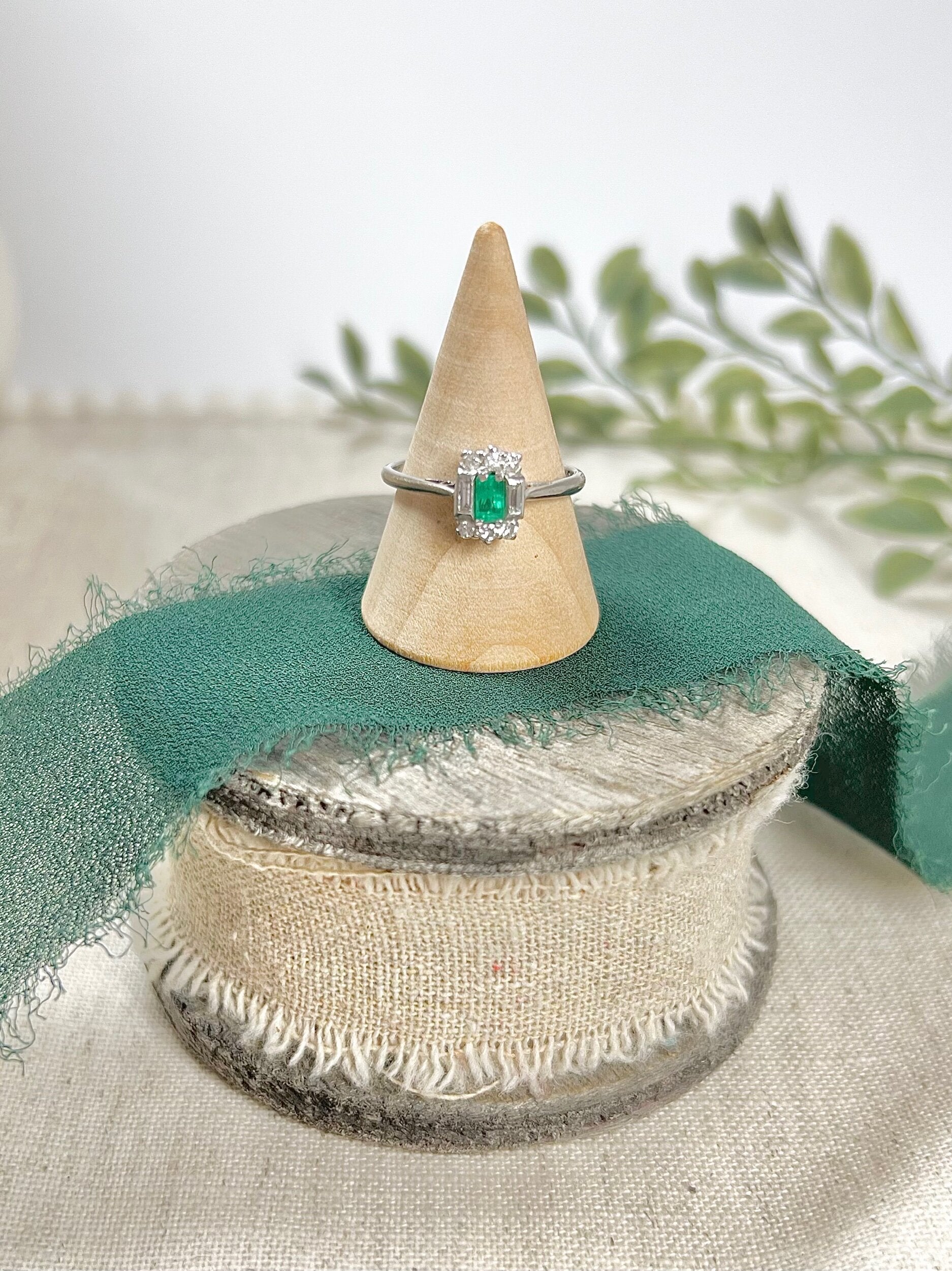 Vintage 18 Carat White Gold Emerald Cut Emerald and Diamond Cluster Ring, Circa 1940