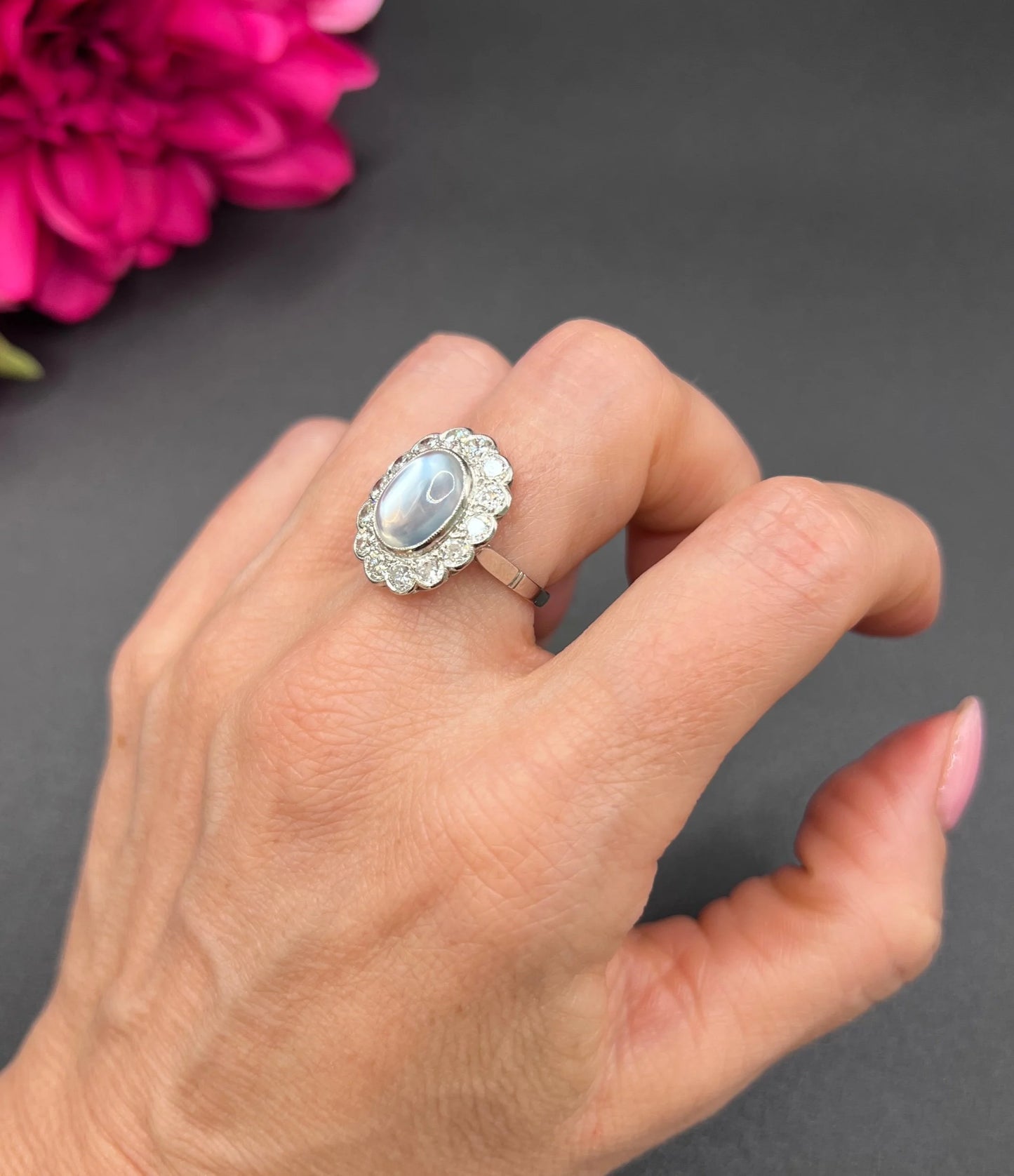 Antique French Platinum Cabochon Moonstone and Diamond Cluster Ring, Circa 1920