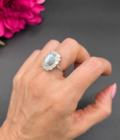 Antique French Platinum Cabochon Moonstone and Diamond Cluster Ring, Circa 1920