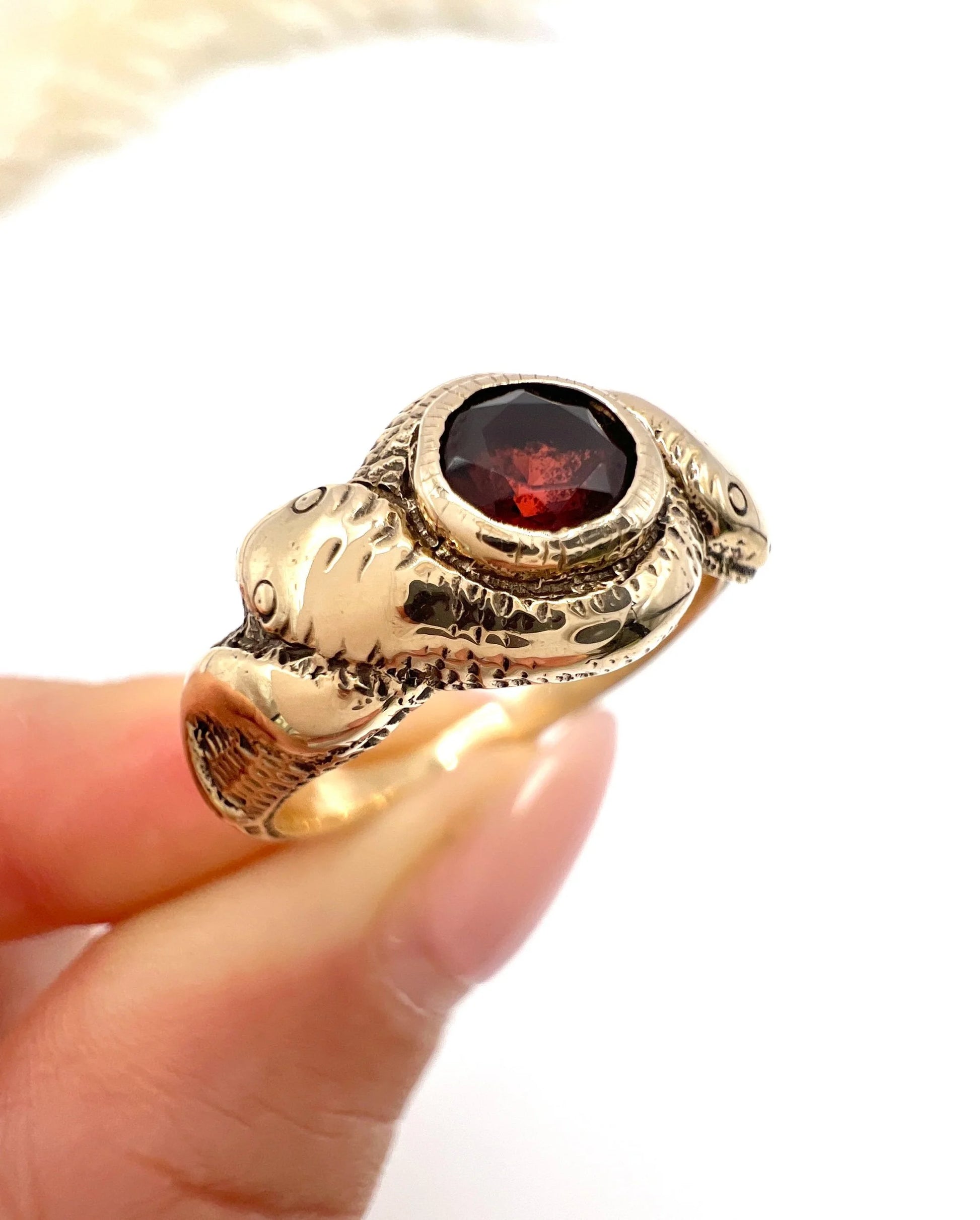 Edwardian 10 Carat Rose Gold Garnet Double-Headed Snake Ring, Circa 1910
