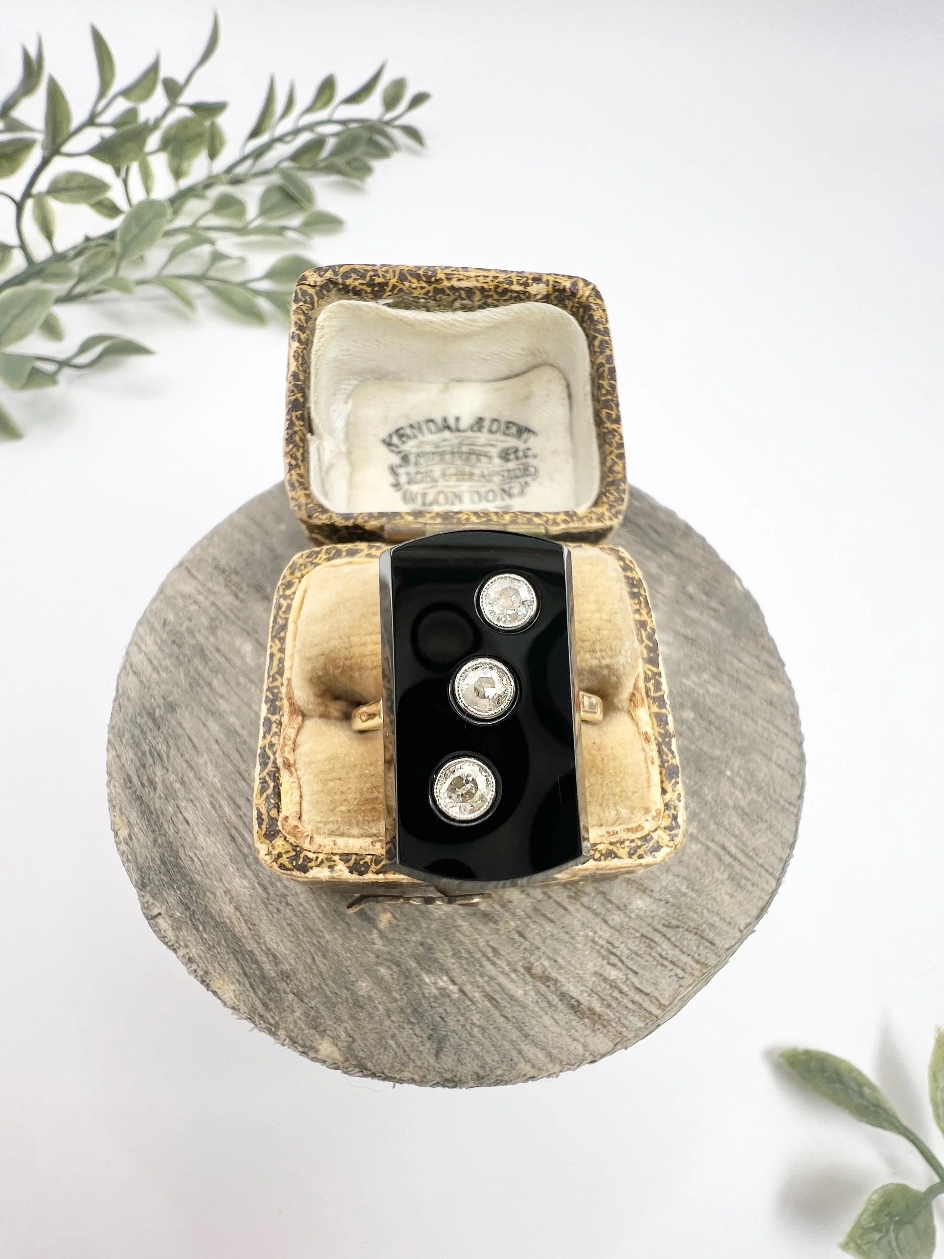 Art Deco 18 Carat Gold Rectangular Onyx and Diamond Three Stone Ring, Circa 1920