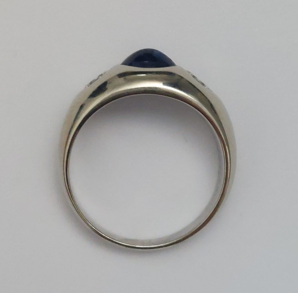 Cabochon Sapphire and Diamond Three Stone Ring