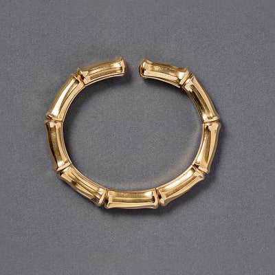 Cartier 18ct Yellow Gold Bamboo Bangle Bracelet, in the shape of a stylized bamboo branch. Signed and numbered: Cartier, 648589. Cartier size 1