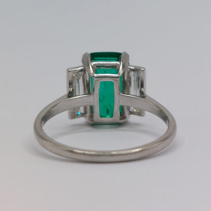 Colombian Emerald Ring with Baguette Diamond Shoulders in Platinum