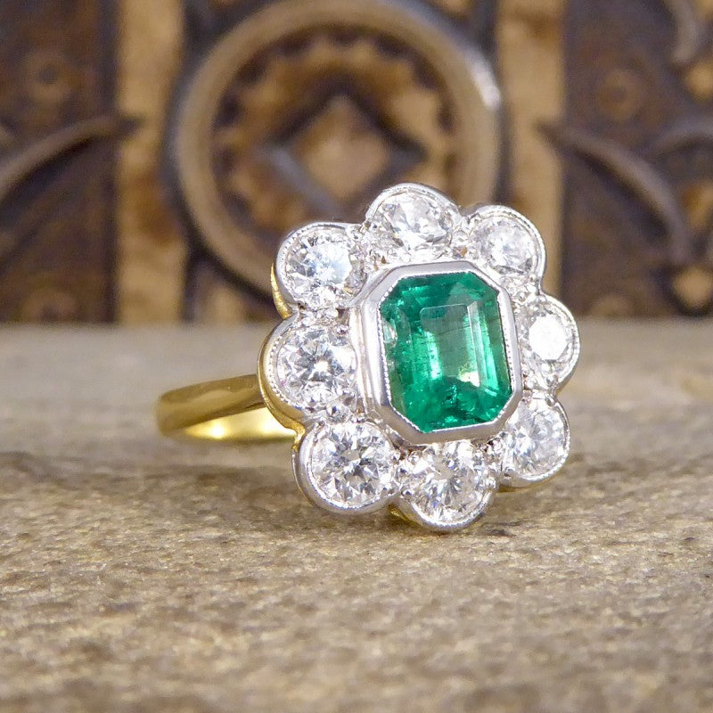 Contemporary 0.90ct Emerald and Diamond Cluster Ring