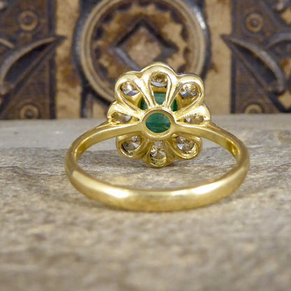 Contemporary 0.90ct Emerald and Diamond Cluster Ring