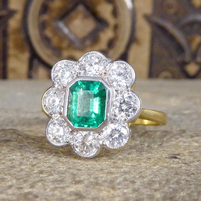 Contemporary 0.90ct Emerald and Diamond Cluster Ring