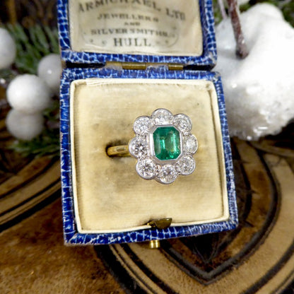 Contemporary 0.90ct Emerald and Diamond Cluster Ring