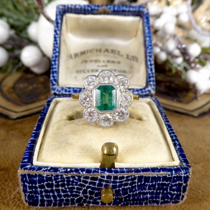 Contemporary 0.90ct Emerald and Diamond Cluster Ring