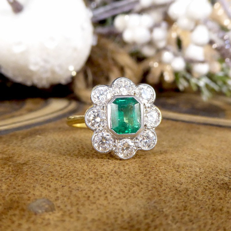 Contemporary 0.90ct Emerald and Diamond Cluster Ring