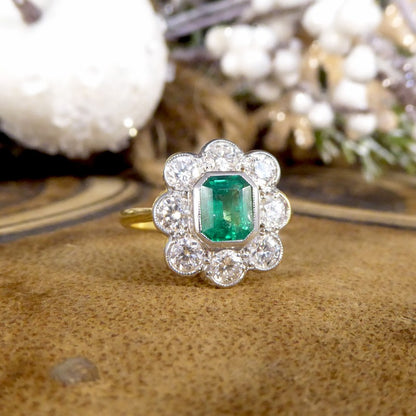 Contemporary 0.90ct Emerald and Diamond Cluster Ring